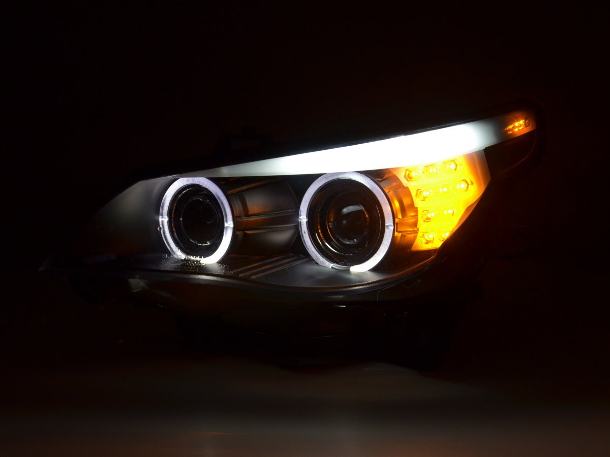Faros delanteros delanteros Xenón Angel Eyes LED BMW Serie 5 E60 / E61 05-08 negros para volante a la derecha