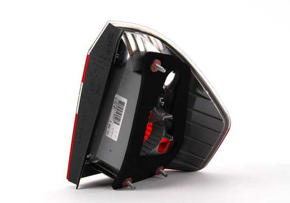 White left side panel rear light for BMW X3 E83 (OEM 63213404103). Original BMW.
