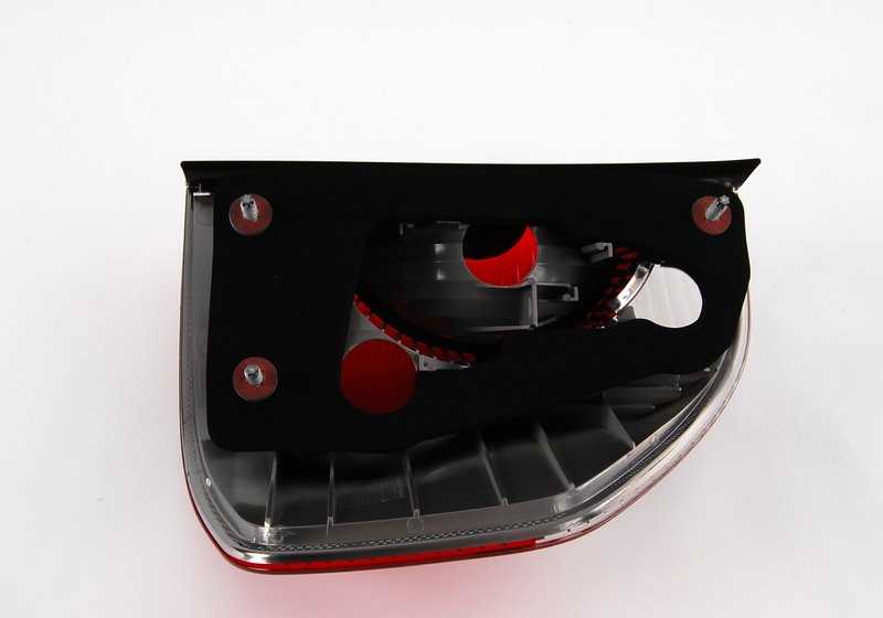 White left side panel rear light for BMW X3 E83 (OEM 63213404103). Original BMW.