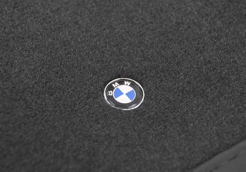 Royal OEM 51478138899 driver's mat for BMW 5 Series E34. Original BMW.