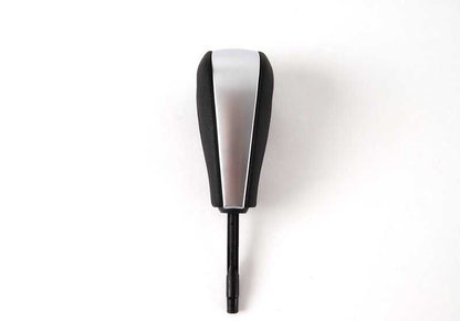 Pomo de cambio automático en piel y cromo OEM 25167570652 para BMW E81, E82, E87, E87N, E88, E90, E90N, E91, E91N, E84, E89. Original BMW.