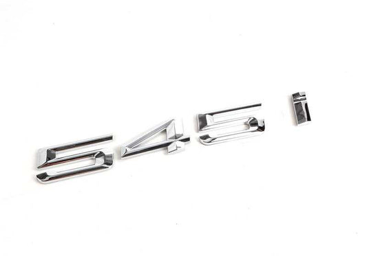 Emblem "545i" OEM 51147111711 for BMW E60 and E61 545i (2003–2005 models). Original BMW.