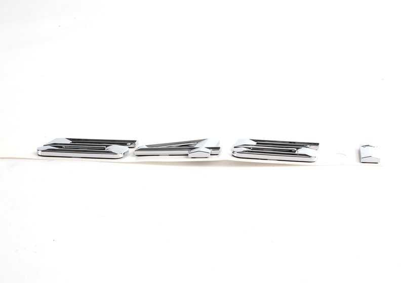 Emblem "545i" OEM 51147111711 for BMW E60 and E61 545i (2003–2005 models). Original BMW.