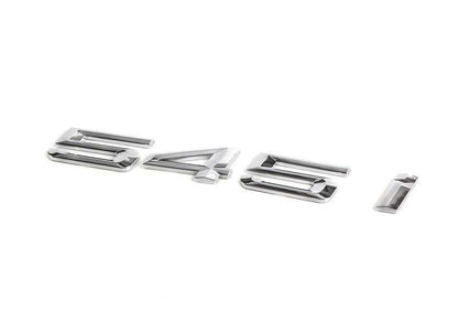 Emblem "545i" OEM 51147111711 for BMW E60 and E61 545i (2003–2005 models). Original BMW.