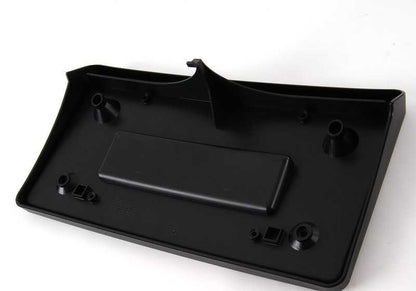 Soporte para matrícula OEM 51113414604 para BMW E83. Original BMW.