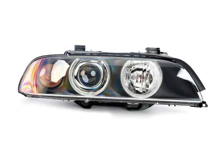 Faro delantero derecho Xenón con intermitente blanco OEM 63126912440 para BMW E39 {525i, 528i} todos los modelos compatibles. Original BMW.
