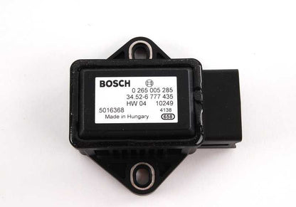 Sensor de giro OEM 34526777435 para BMW E60, E61, E63, E64, E65, E66, E83, E53. Original BMW. Apto para sistemas de dirección activa y control dinámico de estabilidad (DSC).