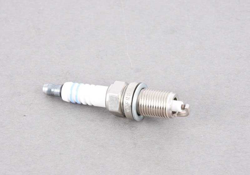 Bujía de encendido OEM 12129065062 para BMW E31. Compatible con motores que utilizan BOSCH FR8LC. Pieza original BMW.
