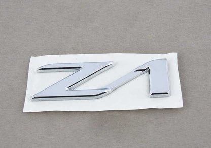 Emblema para varios modelos/series de BMW (OEM 51142290765). Original BMW