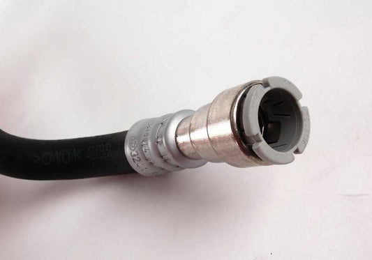 Radiator return pipe for BMW 1 Series E82, E88, 3 Series E90, E91, E92, E93, X1 E84 (OEM 32416781458). Original BMW.