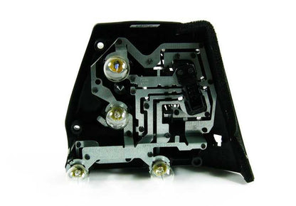 Portalámparas trasero izquierdo OEM 63217165865 para BMW E46. Original BMW.