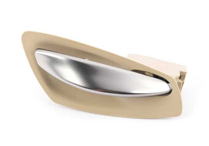 Manecilla interior izquierda para puerta OEM 51417141063 para BMW Z4 E85, E86. Acabado en color beige. Pieza original BMW.
