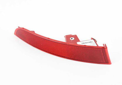 Catadióptrico trasero izquierdo OEM 63148091925 para BMW X5 G05, G05N y BMW X7 G07, G07N. Original BMW.