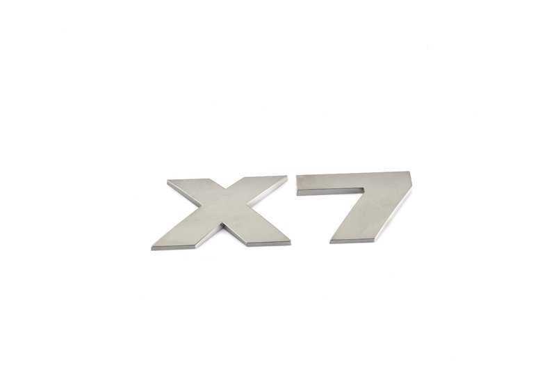 Emblema trasero "X7" OEM 51148093999 para BMW X7 G07. Pieza original BMW.