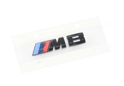 Emblema decorativo parrilla frontal izquierda OEM 51138469499 para BMW F91, F92, F93 M8 Competition. Original BMW.