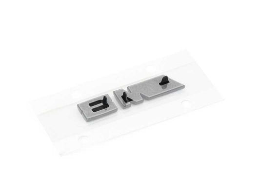 Emblema decorativo parrilla frontal izquierda OEM 51138469499 para BMW F91, F92, F93 M8 Competition. Original BMW.
