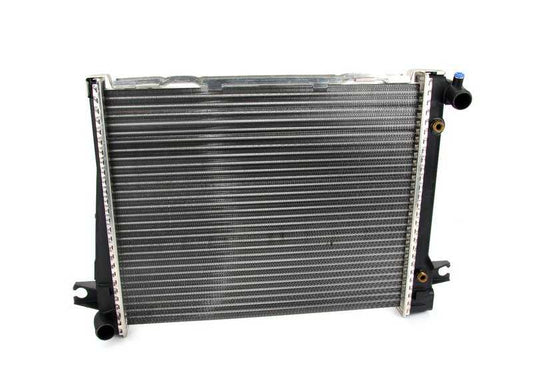 Radiador de agua con refrigeración de aceite de cambio OEM 17111176901 para BMW Serie 3 E30 (320i, 323i) con motores M20 y transmisión automática. Original BMW.