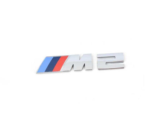 Rack avant d'emblème pour la série BMW 2 F87N (OEM 51148097498). BMW d'origine