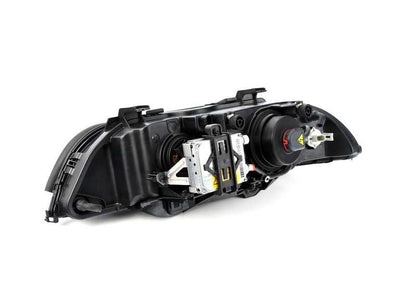 Faro delantero derecho con luz de xenón OEM 63128386560 para BMW E39. Original BMW.