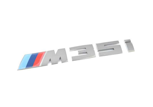 Emblème arrière "x2" OEM 51148072122 pour BMW F39 (BMW d'origine).