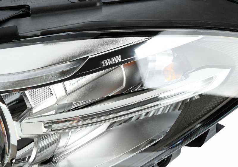 Faro delantero izquierdo Xenón AHL OEM 63117343905 para BMW F10 y F10N. Original BMW.