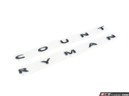 Emblème arrière “MINI Countryman” Piano Black OEM 51149852046 pour MINI Countryman F60 (2015-2020), Countryman F60 LCI (2019-2024). Original MINI.