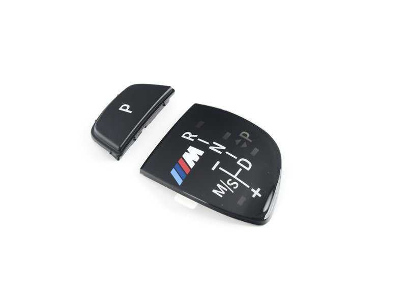Embellecedor palanca cambios M Performance carbono OEM 61312250703 para BMW F10, F11, F06, F12, F13. Compatible con modelos con cambio automático deportivo. Original BMW.