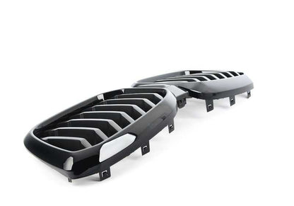 Rejilla decorativa delantera OEM 51135A1AC55 para BMW X3 G01N, G08N y X4 G02N. Pieza original BMW.