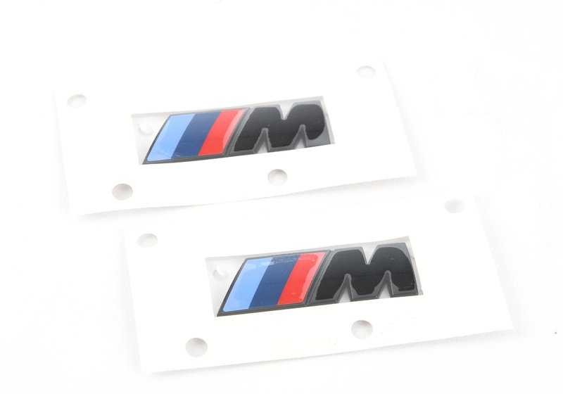 M side logos (set of 2) gloss black for BMW G42, G20, G21, G28, G22, G23, G26, G05, G18, G06, G07. Original BMW.