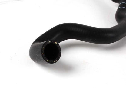 Manguera de retorno OEM 11531744054 para BMW E39 y E38 (520i con motor M52, manual y automático). Original BMW.