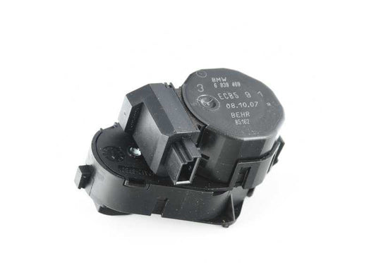 Motor actuador trampilla ventilación/desempañado OEM 64116939409 para BMW E36. Original BMW.