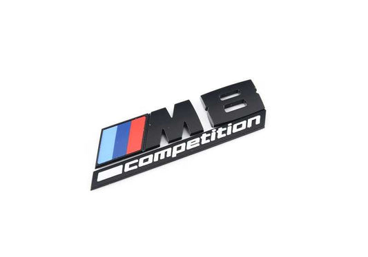 Decorative emblem "M8 Competition" OEM 51168099567 for BMW F91, F92, F93. Original BMW piece to beautify the central console.