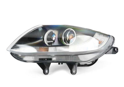 Faro delantero izquierdo OEM 63127165677 para BMW Z4 E85. Original BMW.