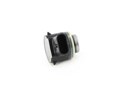 Sensor de aparcamiento ultrasónico gris Donington OEM 66208064927 para BMW F90, G30, G31, F97, F98, F85, F16, F86. Compatible con sistemas PDC y Parkmanöverassistent. Original BMW.