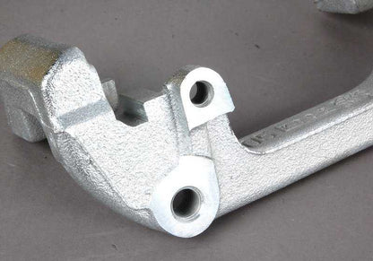 Soporte pinza de freno trasero OEM 34106758120 para BMW E36, E46, Z3, E85. Original BMW.