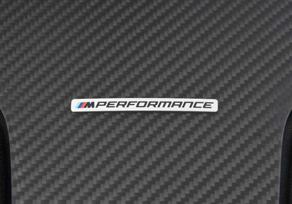 Respaldo asiento M Performance OEM 52105A40304 para BMW G20 {316d, 318d}. Acabado en carbono brillante y Alcantara. Mejora estética interior con estilo deportivo. Original BMW.