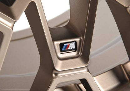 Alloy tires M Sternspeiche 827 OEM 36107884365 for BMW G80 (Series 3) and G82 (Series 4). Measures 9.5x19 ET20. Bronze gold color. Original BMW.