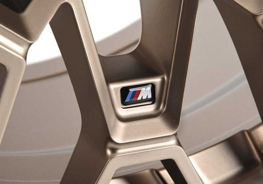 Alloy tires M Sternspeiche 827 OEM 36107884365 for BMW G80 (Series 3) and G82 (Series 4). Measures 9.5x19 ET20. Bronze gold color. Original BMW.