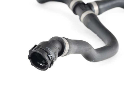 OEM refrigerant tube 17127639027 for BMW E84. Conduct the engine coolant. Original BMW replacement.