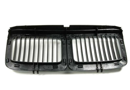 Rejilla decorativa central OEM 51131964863 para BMW E32. Original BMW.