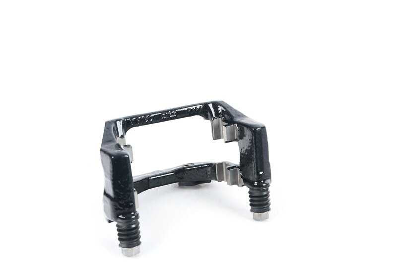 Soporte de pinza de freno trasero derecho OEM 34206870634 para BMW I12, I12N, I15. Original BMW.
