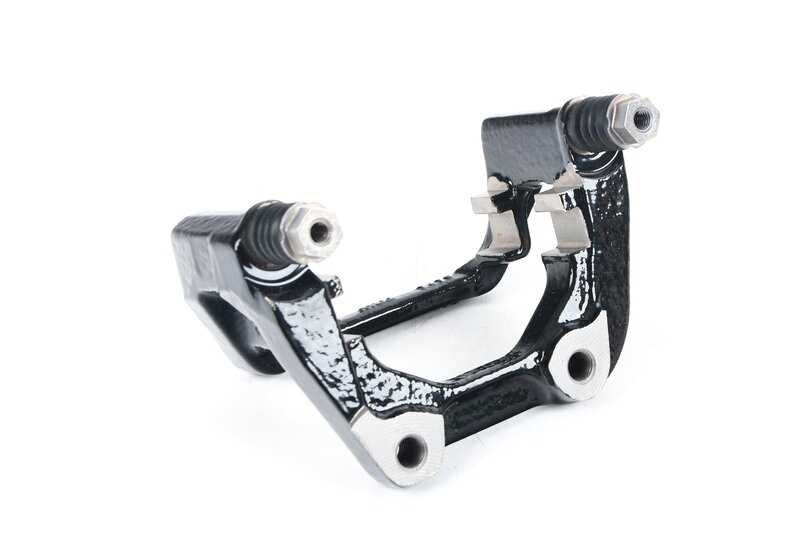 Soporte de pinza de freno trasero derecho OEM 34206870634 para BMW I12, I12N, I15. Original BMW.