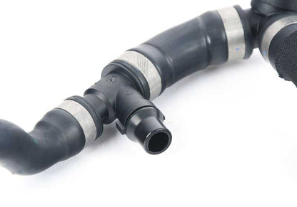 Tubería de retorno del refrigerante OEM 17129894760 para BMW G01, G02. Original BMW.
