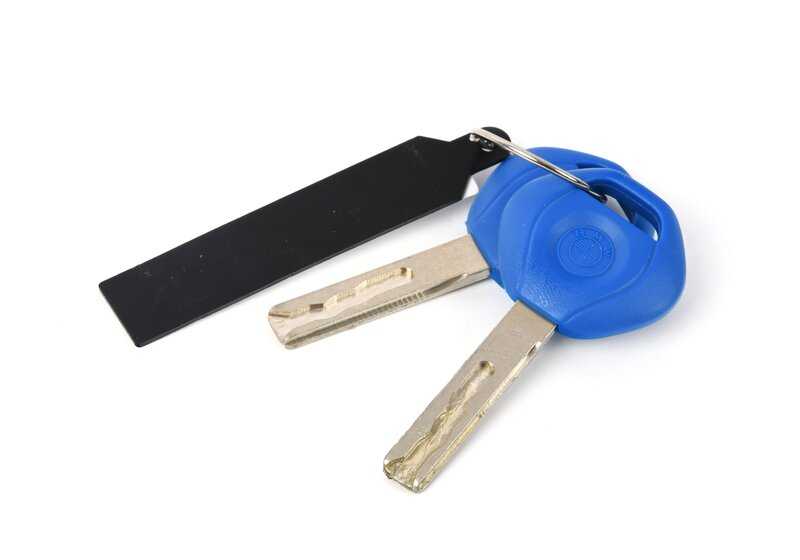 Cilindro di chiusura con OEM chiave 5121293147 per la serie BMW 1 (E84). BMW originale.
