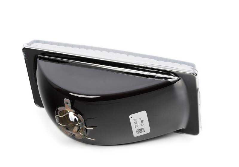 Left Headlight Insert for BMW E30, E28, E24, E23 (OEM 63171375049). Original BMW