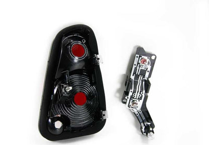 Luz trasera izquierda OEM 63217166959 para MINI R50, R53, Cabrio R52. Original MINI.