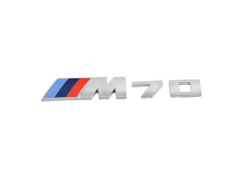 Emblem for BMW 7 Series G70 (OEM 51145A63D07). Genuine BMW.