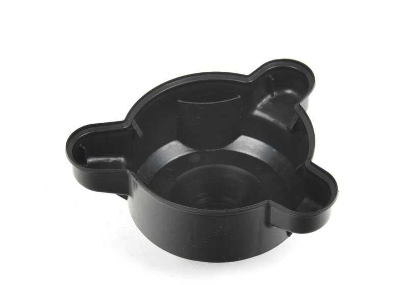 Tapa protectora OEM 33521093418 para BMW E39. Pieza original BMW. Ideal para cubrir y proteger componentes del amortiguador trasero.