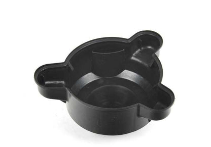 Tapa protectora OEM 33521093418 para BMW E39. Pieza original BMW. Ideal para cubrir y proteger componentes del amortiguador trasero.