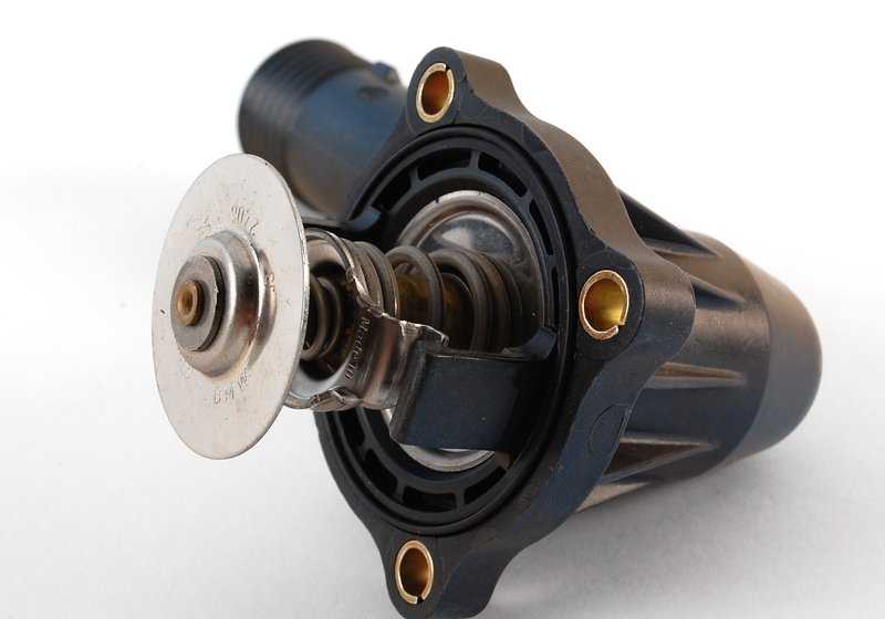 Caja del termostato con termostato OEM 11531739755 para BMW E36 316g, 316i (BE11, BE12, BE21, BE22, CA71, CA72, CA81, CA82, CE11). Compatible con motores M43. Original BMW.